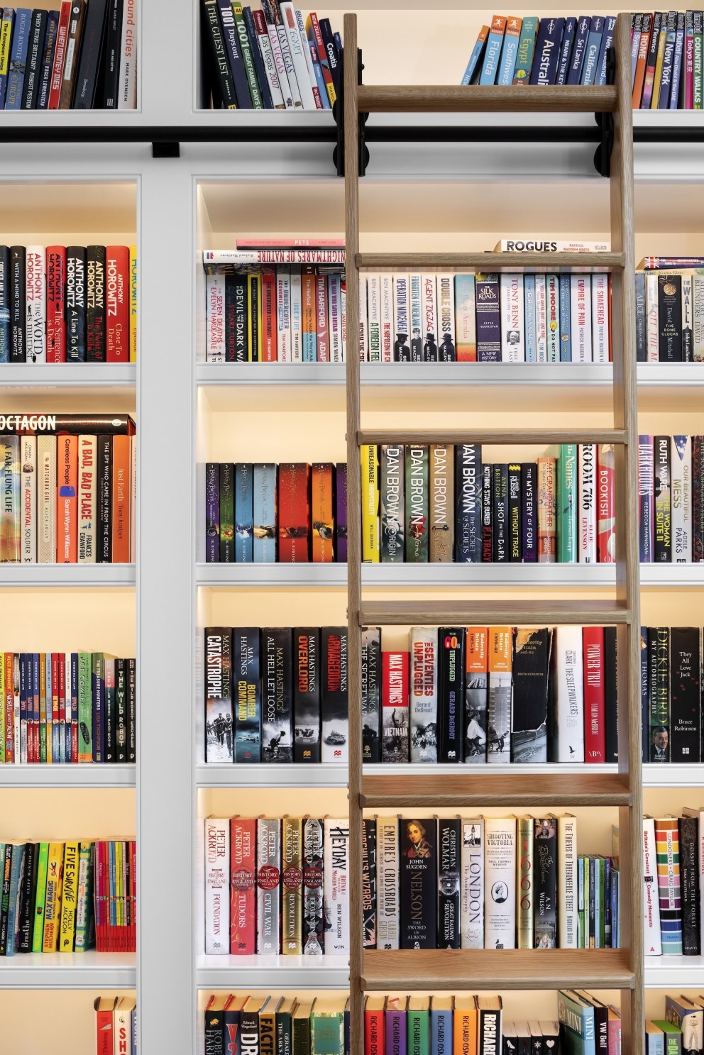 Epping Forest family home | Library bookcase cabinetry | Interior Designers